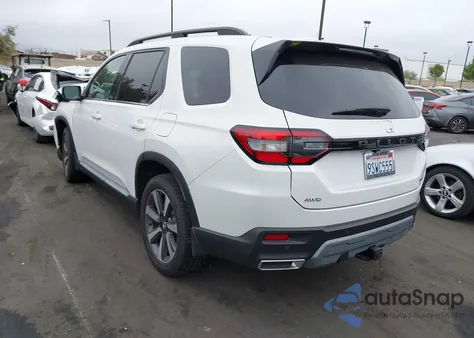 2025 Honda Pilot Touring z USA, uszkodzony, nr VIN 5FNYG1H72SB103673